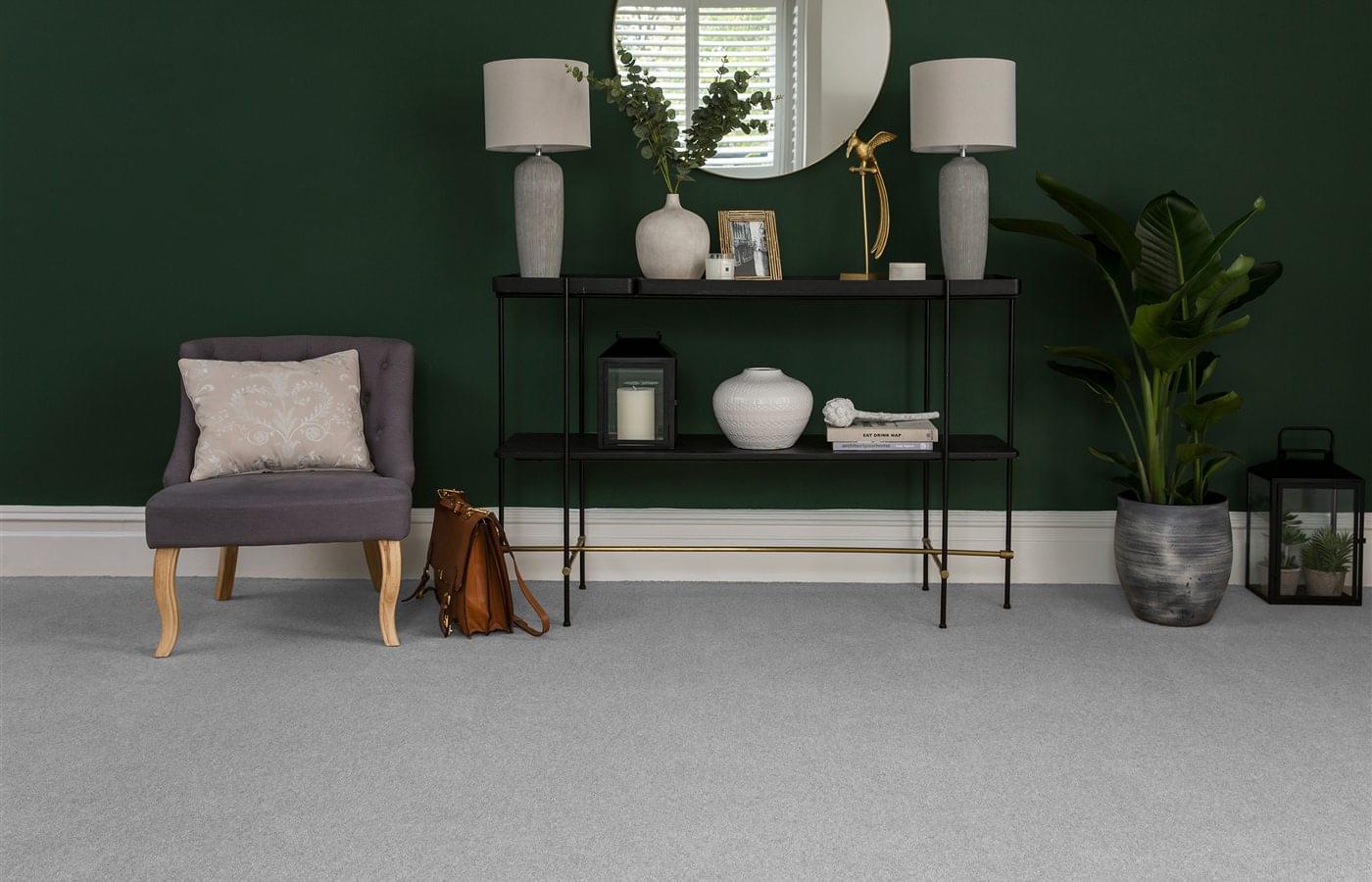 A finished carpet in a stylish green hallway